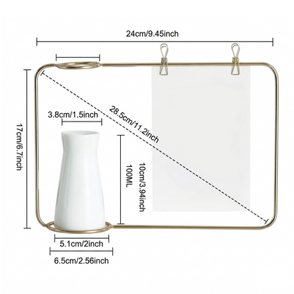 Gold-framed hanging wall mirror with dimension annotations, including a white ceramic vase shown inside the mirror area, on a light gray background.