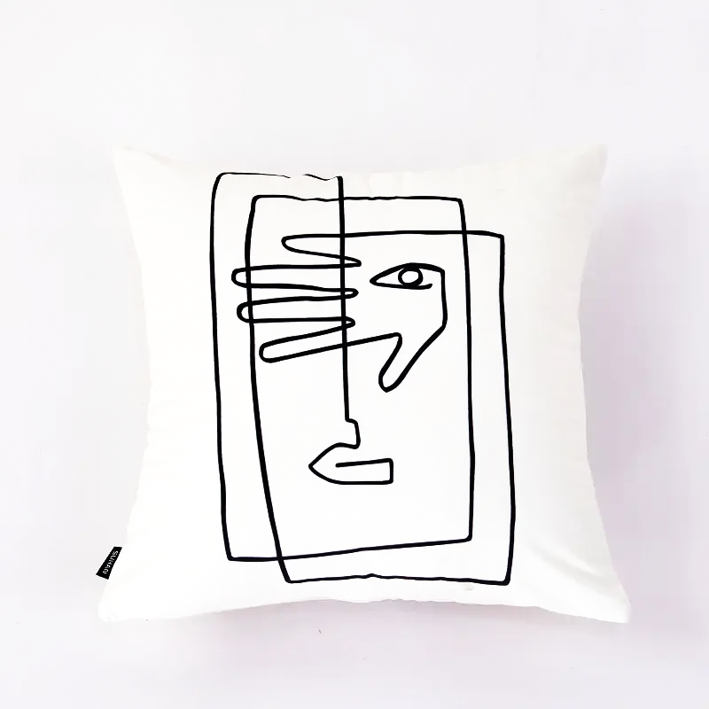 A square white throw pillow featuring a minimalist black line art design of a face and hand, shown against a plain white background.