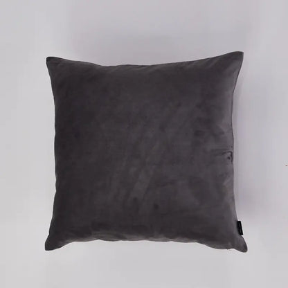 A square dark gray velvet throw pillow shown against a plain light gray background.